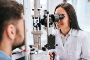 Eye Doctor Examining Patient