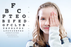Young Lady Reading Eye Chart