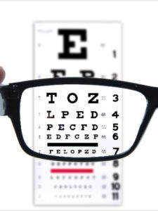 Eye chart looking through new eyeglasses