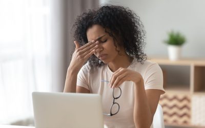 Woman with Eyestrain at a Computer