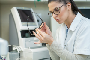 Female Technician Making Eyeglasses